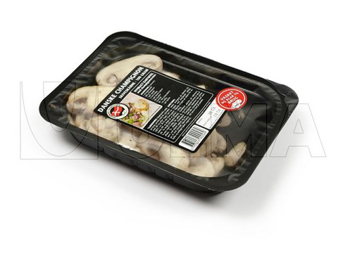 Geschnittene Champignons im Tiefziehverfahren verpackt